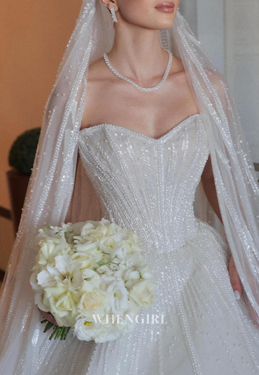 A-Line Sweetheart Beaded Sleeveless Wedding Dress with Veil
