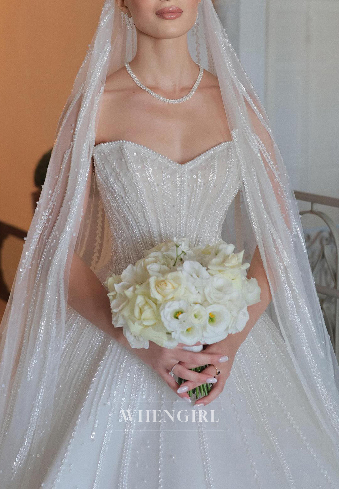 A-Line Sweetheart Beaded Sleeveless Wedding Dress with Veil