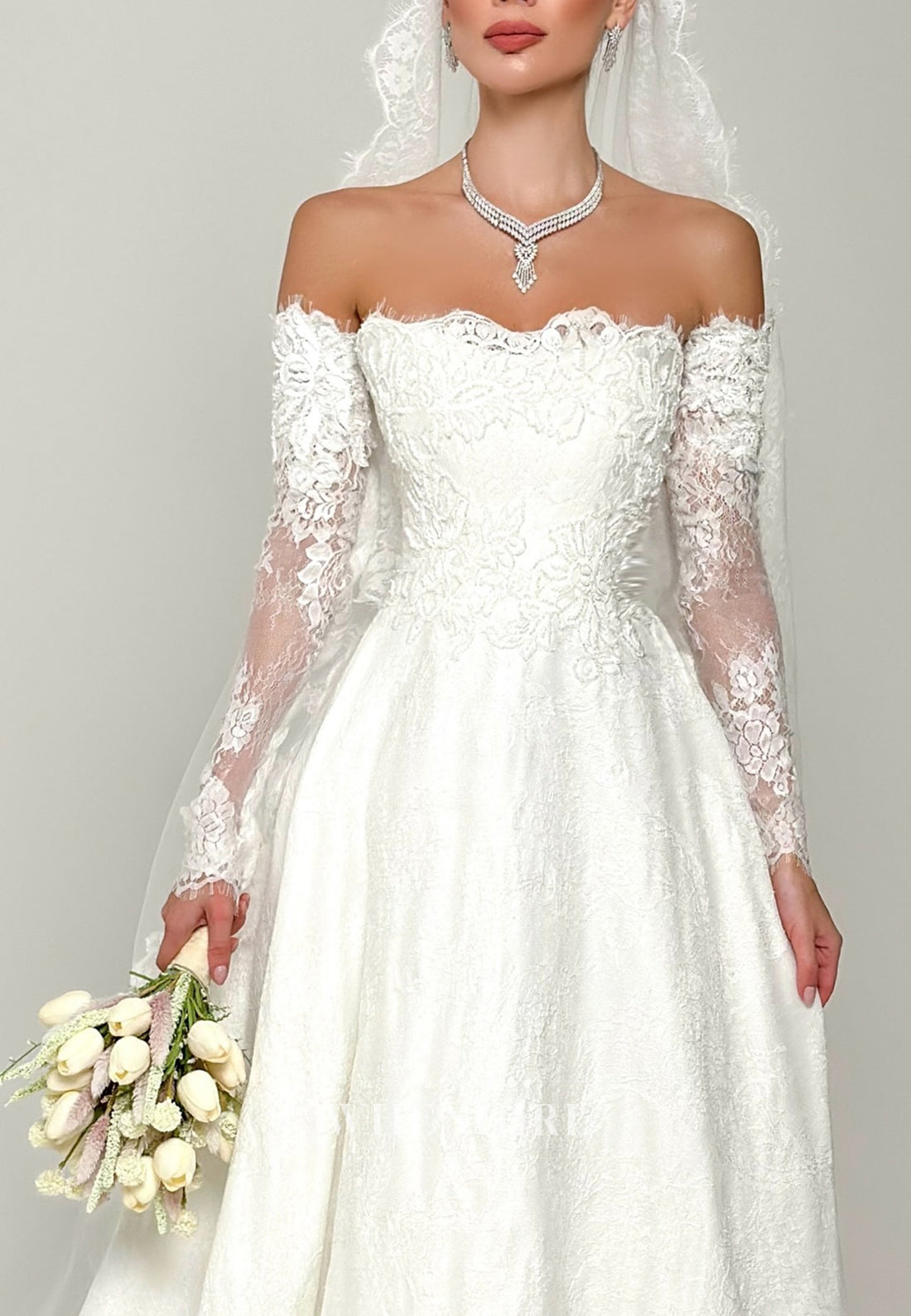 A-Line Strapless Appliqued Lace Sweep Train Wedding Dress with Long Sleeves