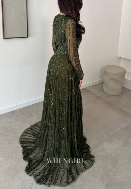 Heavily Beaded Illusion Long Sleeve Evening Gown