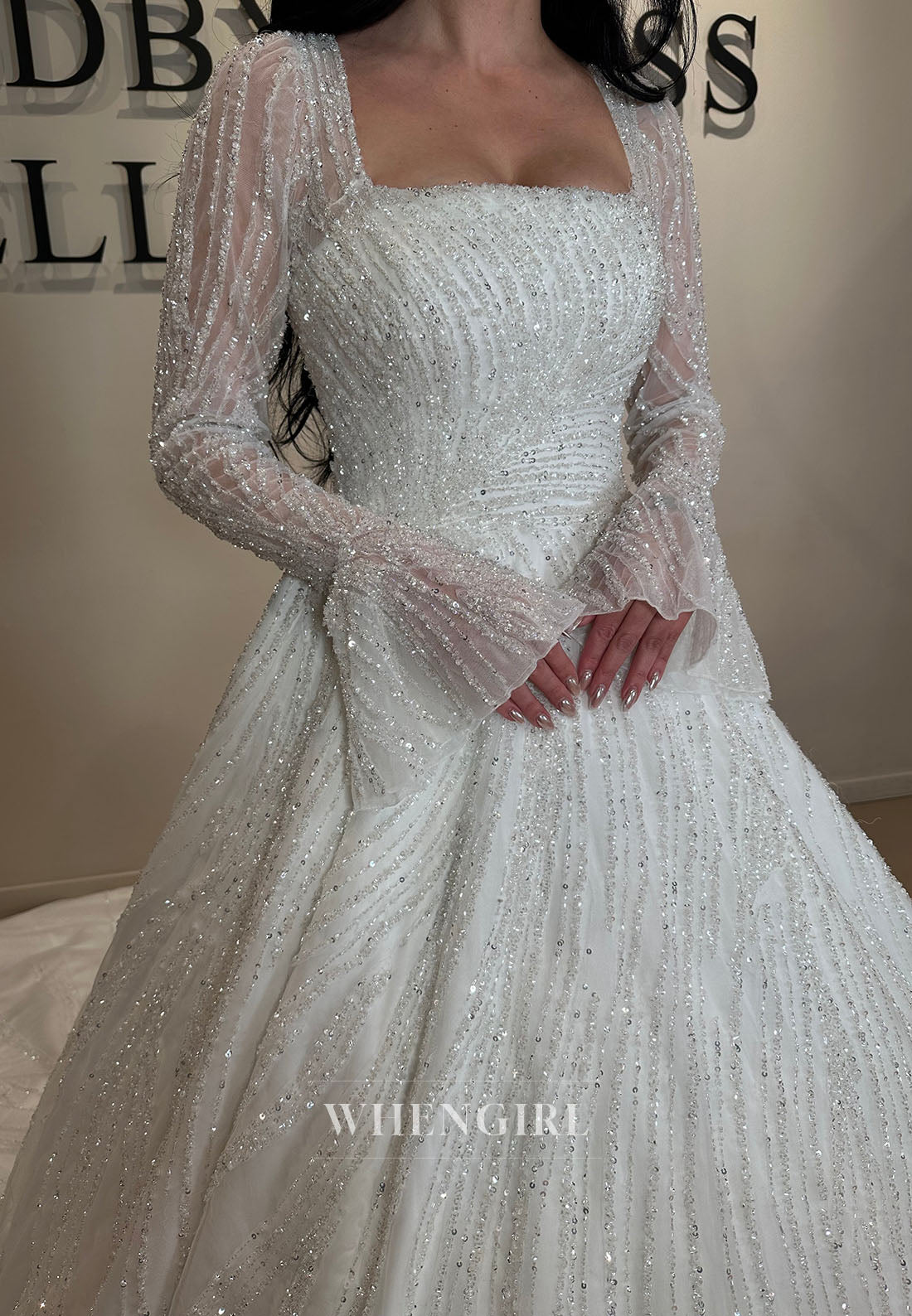Beaded Ball Gown Wedding Dress with Long Sleeves